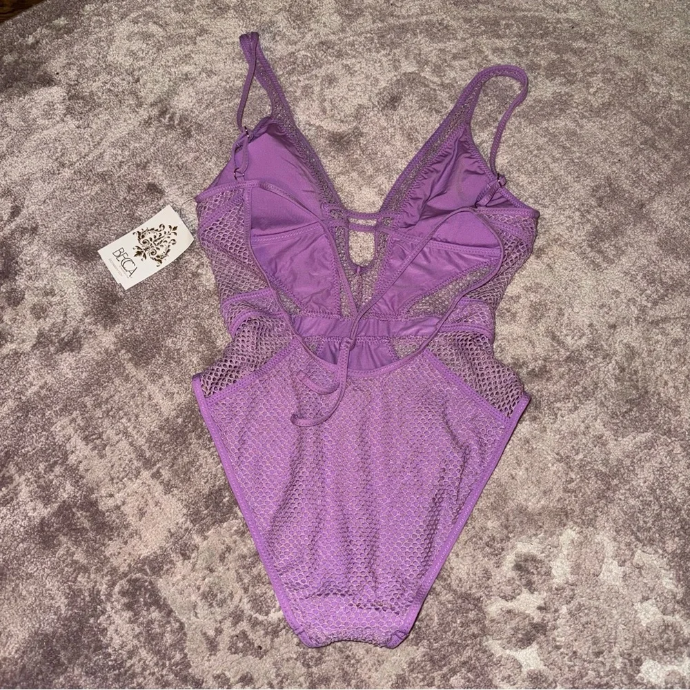 BECCA Small Network Show And Tell Plunge Shimmer Lilac Purple One Piece Swimsuit